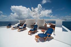 Maldives Liveaboard - Orion. Fly deck with sunbeds.